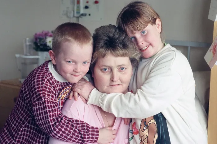 Framed Print : Bridget Dawson with her two young children Framed Print : Bridget Dawson with her two young children