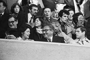 Henry Kissinger watches football match in London, 1976